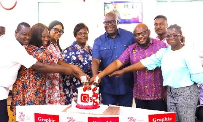 Theophilus Yartey (3rd from right), Editor, Graphic; Dr Charles Nii Ayiku Ayiku (2nd from right), General Manager in charge of External Relations, ECG; Samuel Doe Ablordeppey (left), News Editor, Daily Graphic; Grace Garshong (4th from left), Communications Specialist, ECG, and some staff of GCGL and ECG cutting a cake to celebrate Graphic’s 75th anniversary. Picture: GCGL